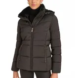 A woman's black puffer jacket with a hood, featuring a high collar, front zipper closure, and zippered side pockets. The interior appears to have a faux fur lining.