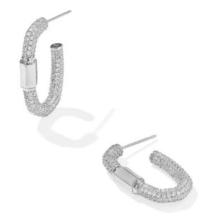 A pair of sparkling, silver hoop earrings encrusted with small diamonds, featuring a rectangular metallic accent on each.