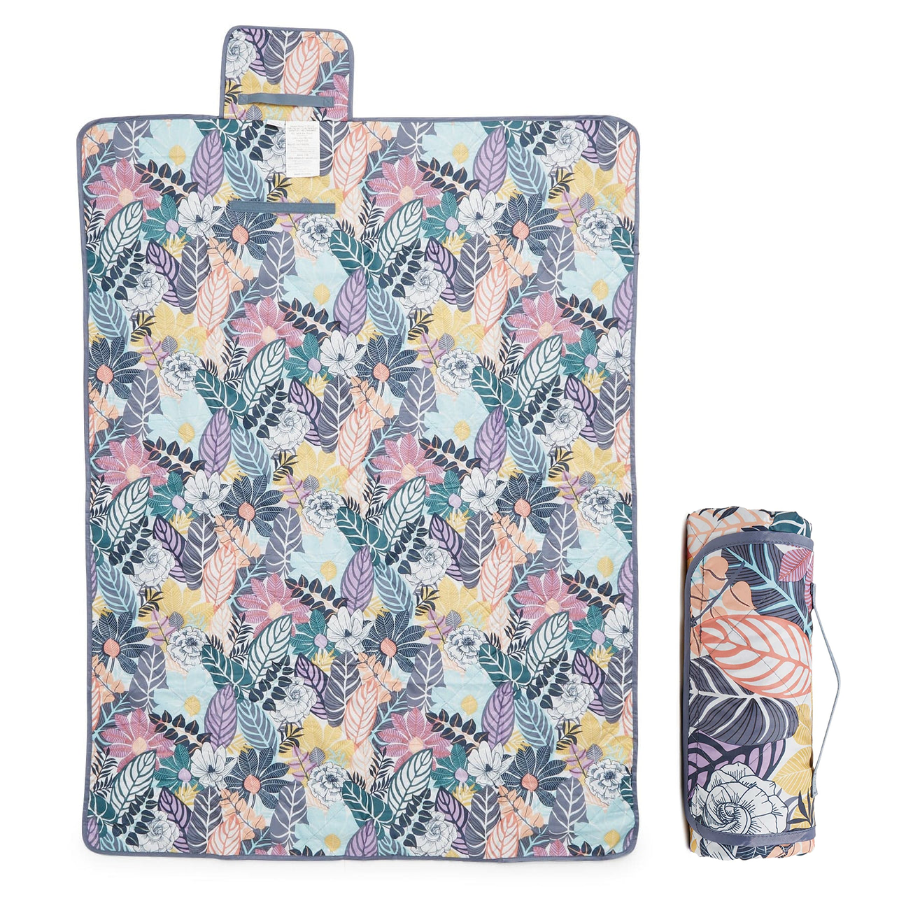 A floral-patterned yoga mat alongside a rolled-up version of the same design.