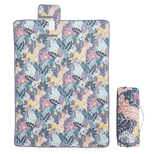 A floral-patterned yoga mat alongside a rolled-up version of the same design.