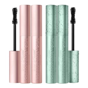 Two pairs of mascara tubes labeled \“Better Than Sex\“ by Too Faced, featuring one pair in pink and the other in green with a water droplet design.