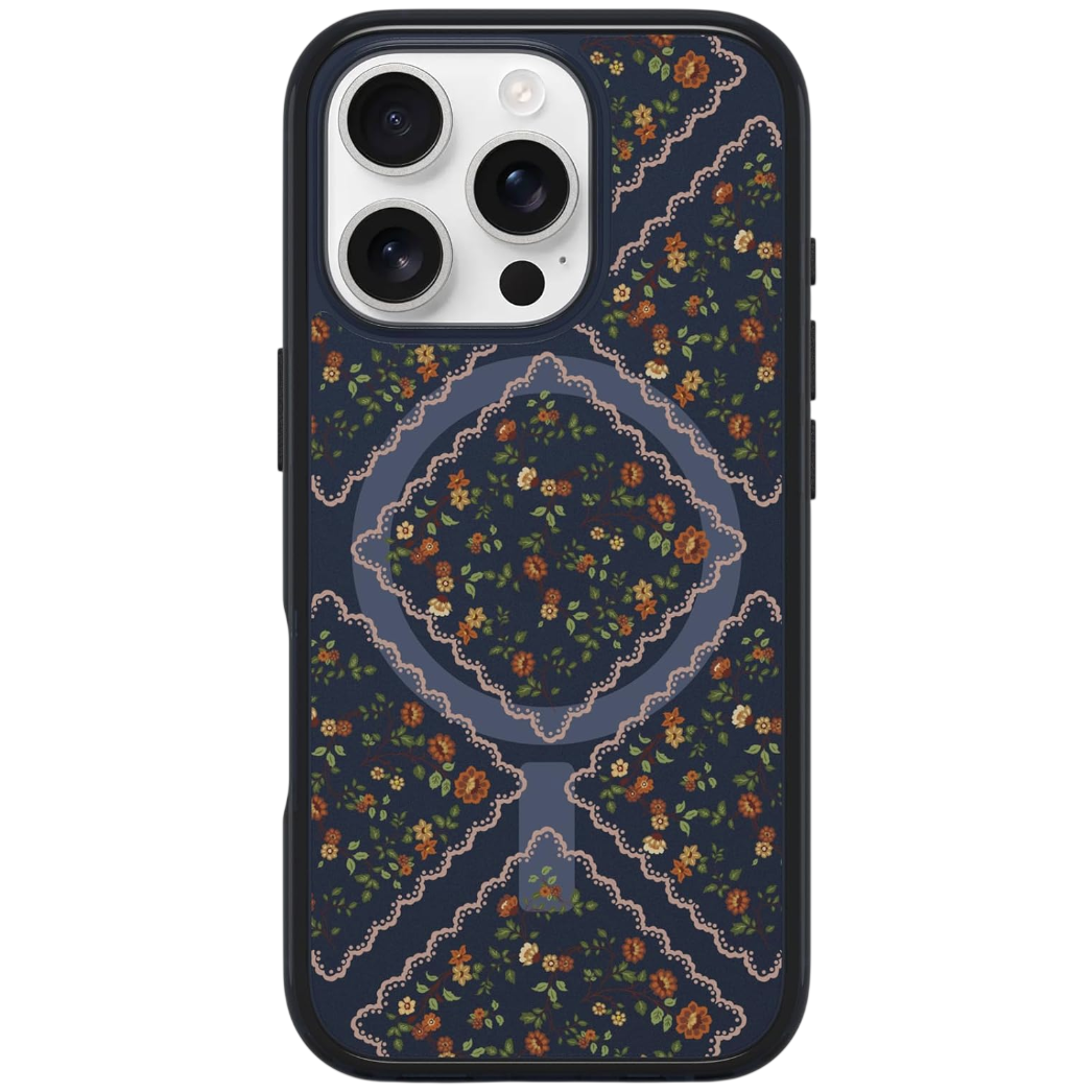 Floral-patterned phone case for an iPhone with three camera lenses. The design includes flowers and scalloped edges in a dark color scheme.