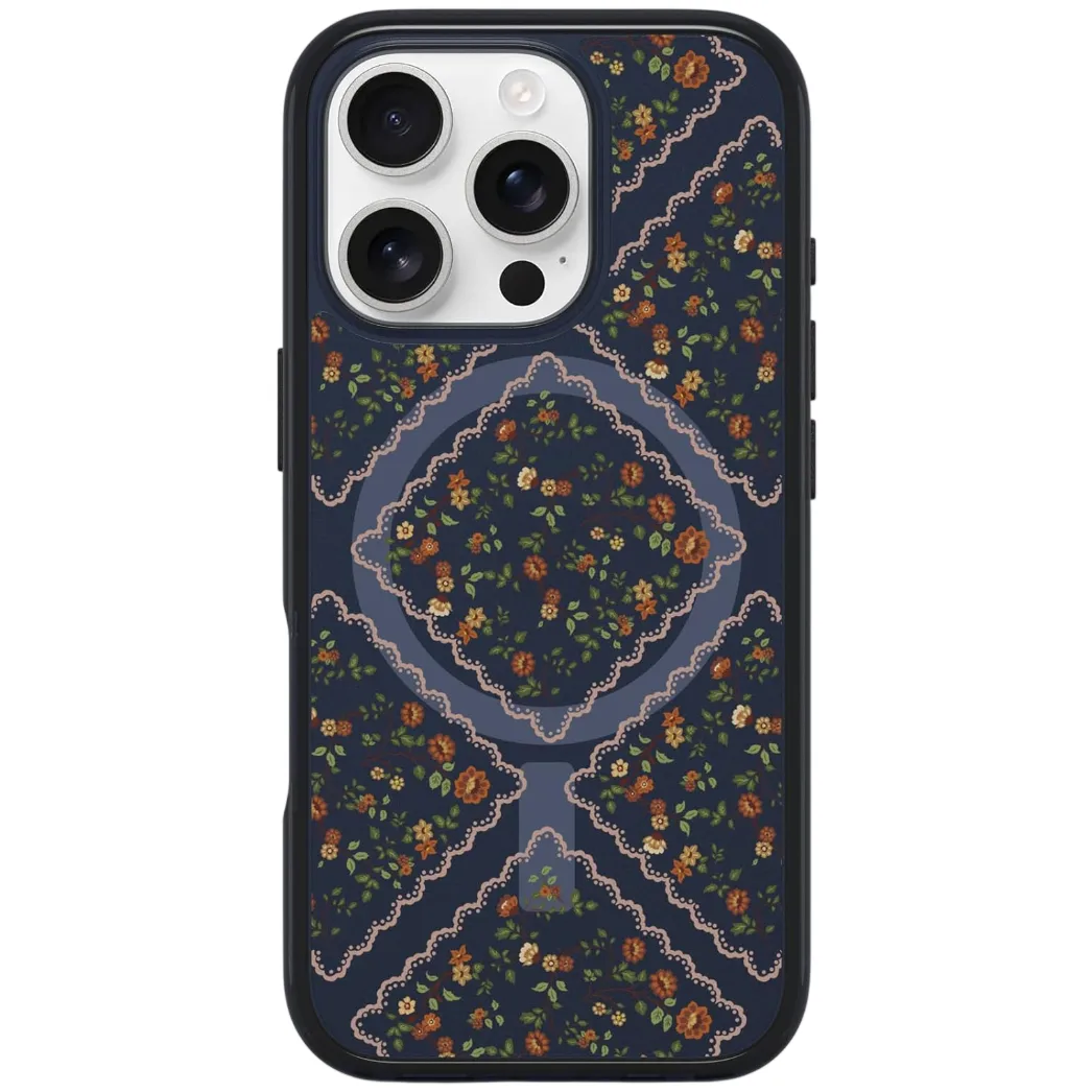 Floral-patterned phone case for an iPhone with three camera lenses. The design includes flowers and scalloped edges in a dark color scheme.