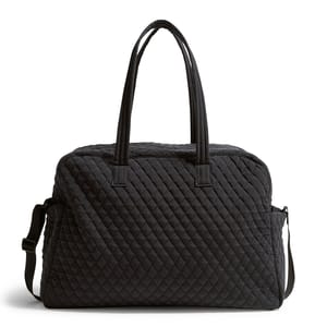 Black quilted tote bag with dual handles and an adjustable shoulder strap.