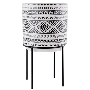 Black and white planter with geometric patterns on a metal stand.