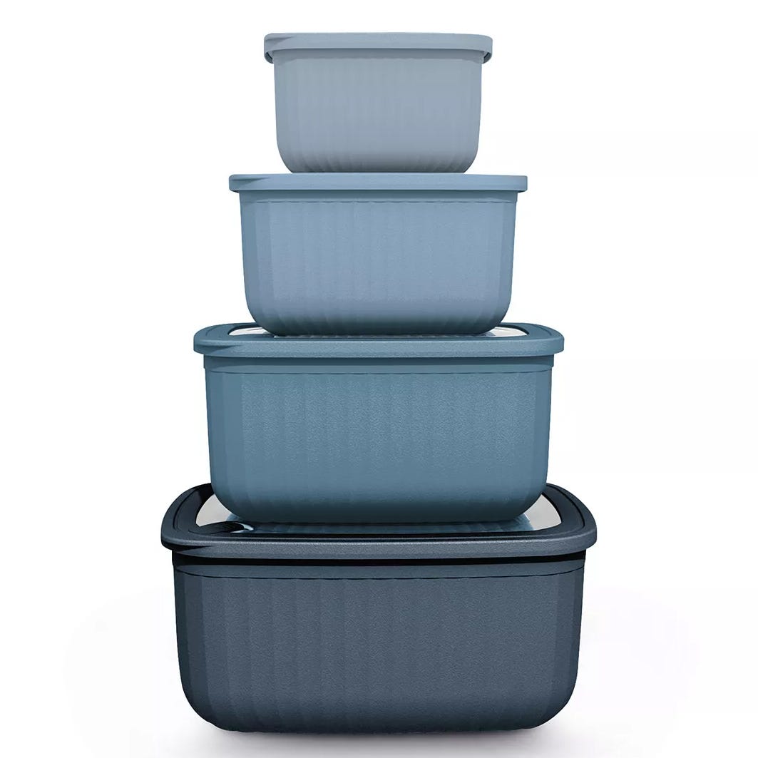 A set of four nesting blue storage containers with lids, each container slightly larger than the one above it, designed for space-saving organization.