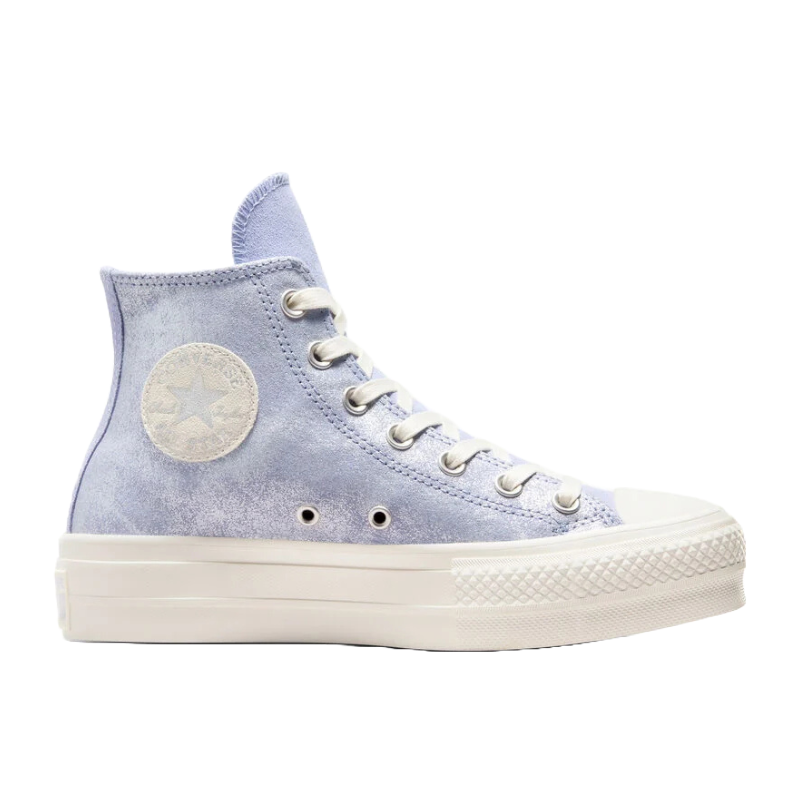 Light blue high-top sneaker with a suede texture, featuring a white star logo patch. It has white laces, a thick white platform sole, and silver eyelets.