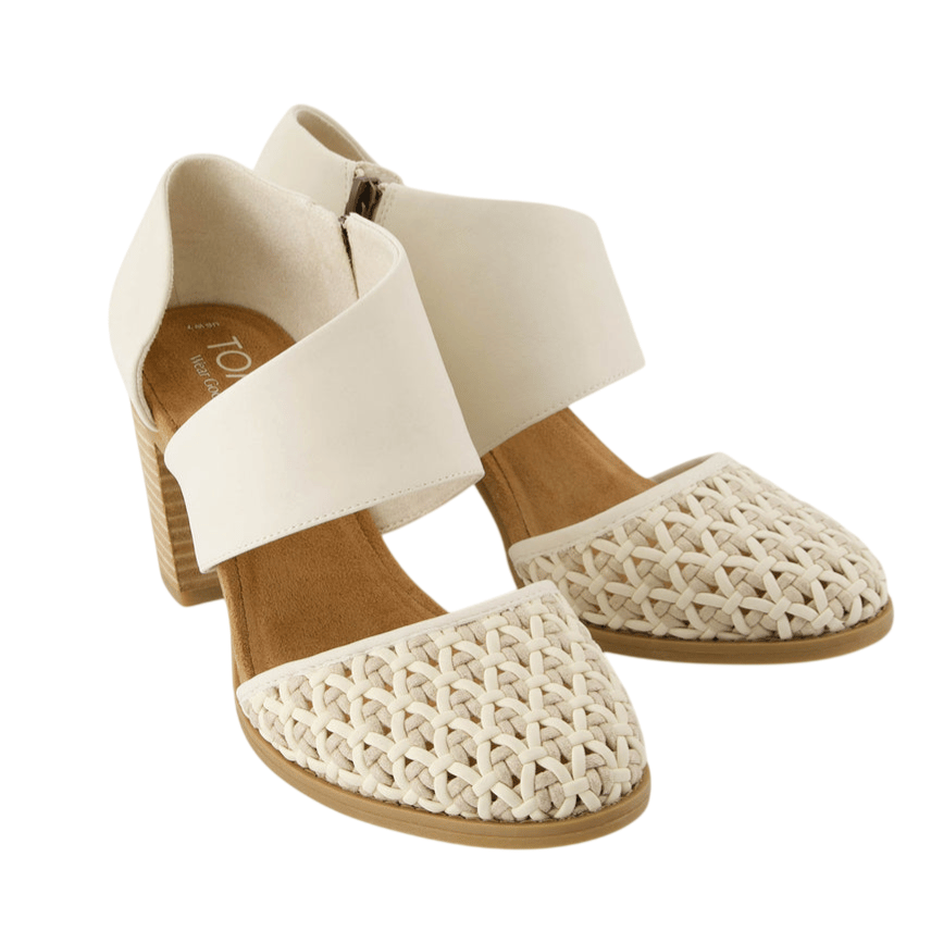 Cream-colored women's shoes with woven closed toe, chunky heel, and wide ankle strap.