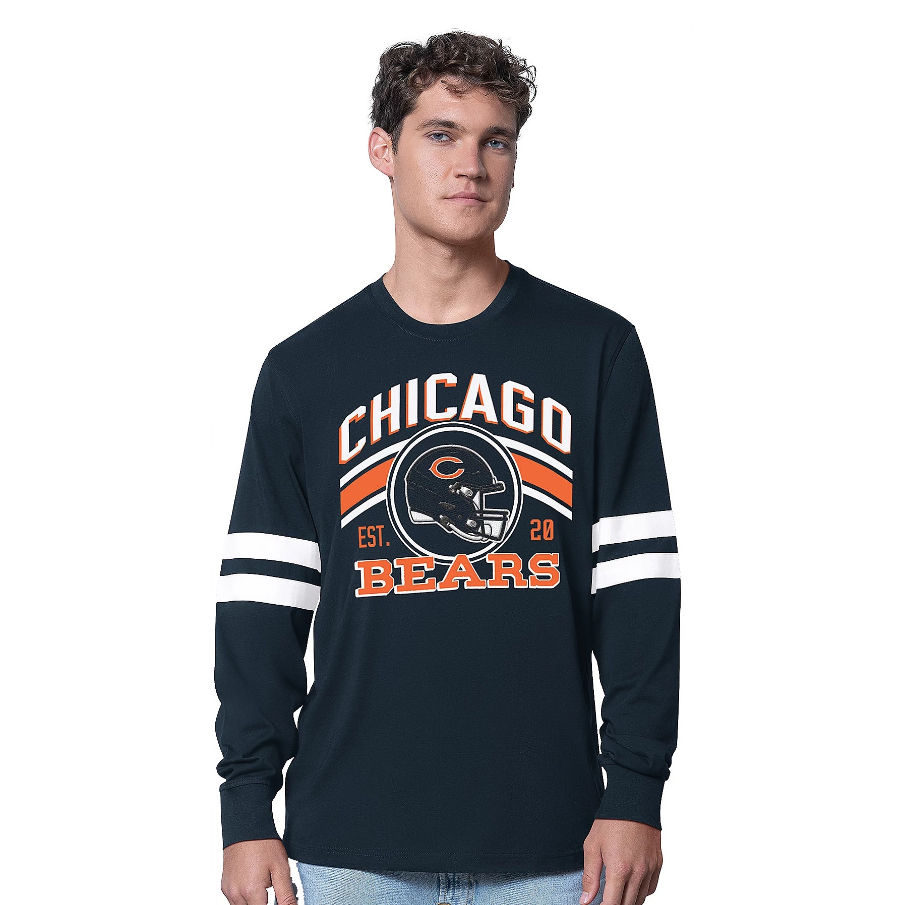 A man models a long-sleeve shirt with \“Chicago Bears\“ graphics and stripes on the sleeves. The shirt features team colors and a logo design.