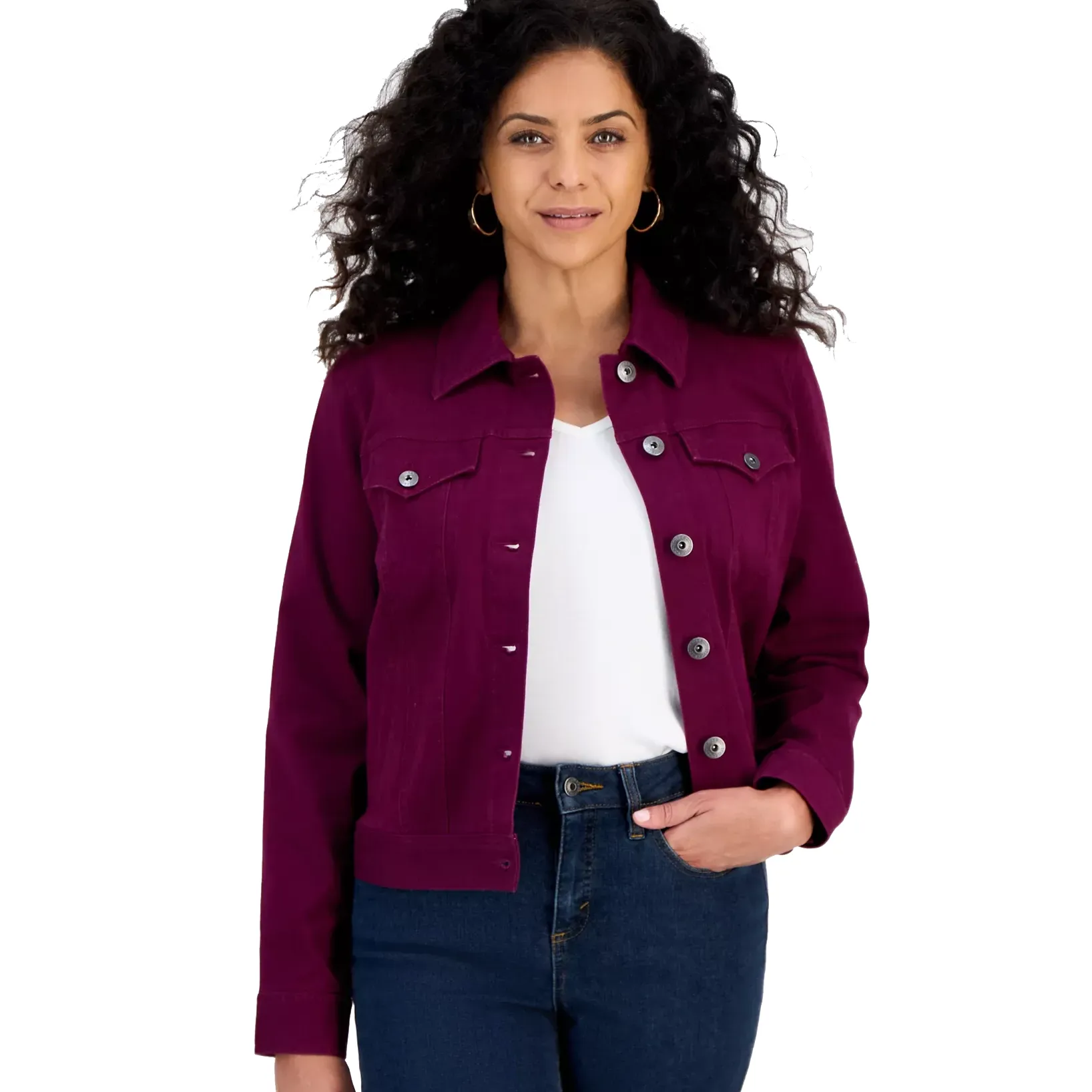 A woman is wearing a maroon button-up jacket over a white shirt and dark jeans.