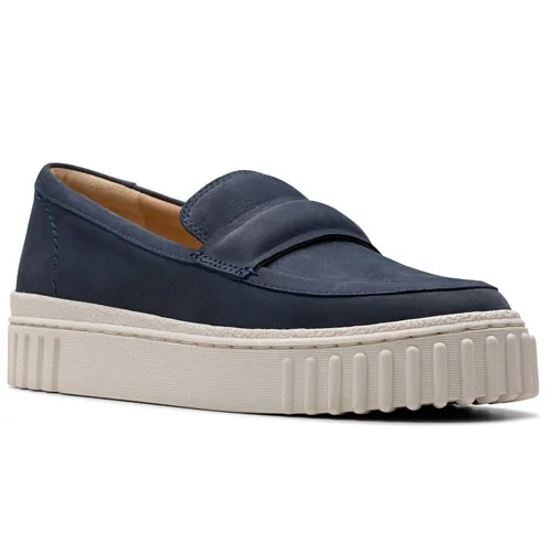 A navy blue loafer with a chunky white ribbed platform sole, offering a modern and casual look.