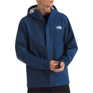 A person wearing a blue The North Face hooded jacket.