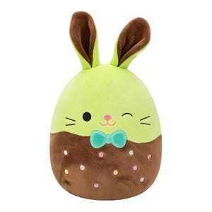 A plush 8\“ Squishmallow bunny with a green and brown body resembling ice cream, featuring a stitched face, a teal bow tie, brown ears, and multicolored sprinkle accents.
