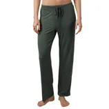 Dark green drawstring lounge pants with a relaxed fit, shown on a person standing barefoot.