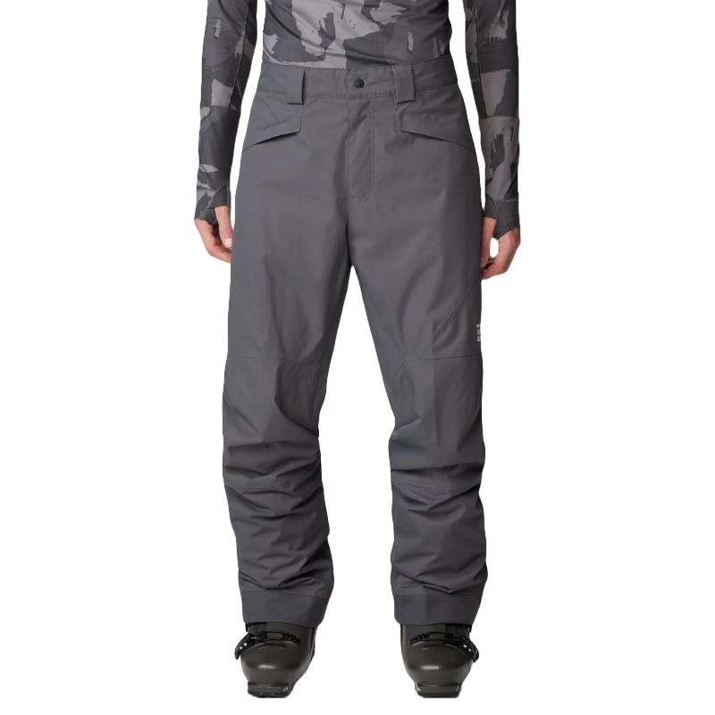 Dark gray snow pants with reinforced knees, side pockets with flaps, and a button and zip closure, designed for snow sports. They pair with black snow boots.