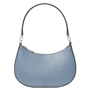 Small blue Kate Spade New York handbag with a curved shape, single handle, and zip closure.