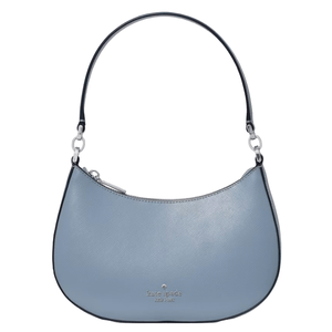 Small blue Kate Spade New York handbag with a curved shape, single handle, and zip closure.
