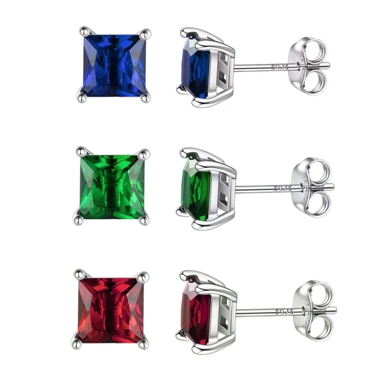 Three pairs of stud earrings with square-cut gemstones in blue, green, and red, set in silver prong settings.