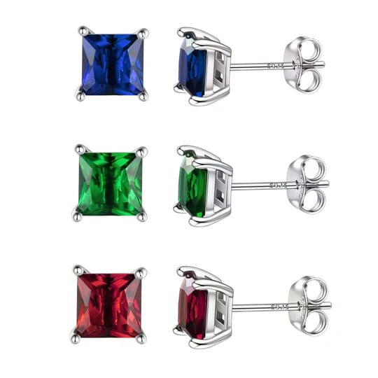 Three pairs of stud earrings with square-cut gemstones in blue, green, and red, set in silver prong settings.
