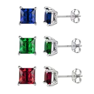 Three pairs of stud earrings with square-cut gemstones in blue, green, and red, set in silver prong settings.