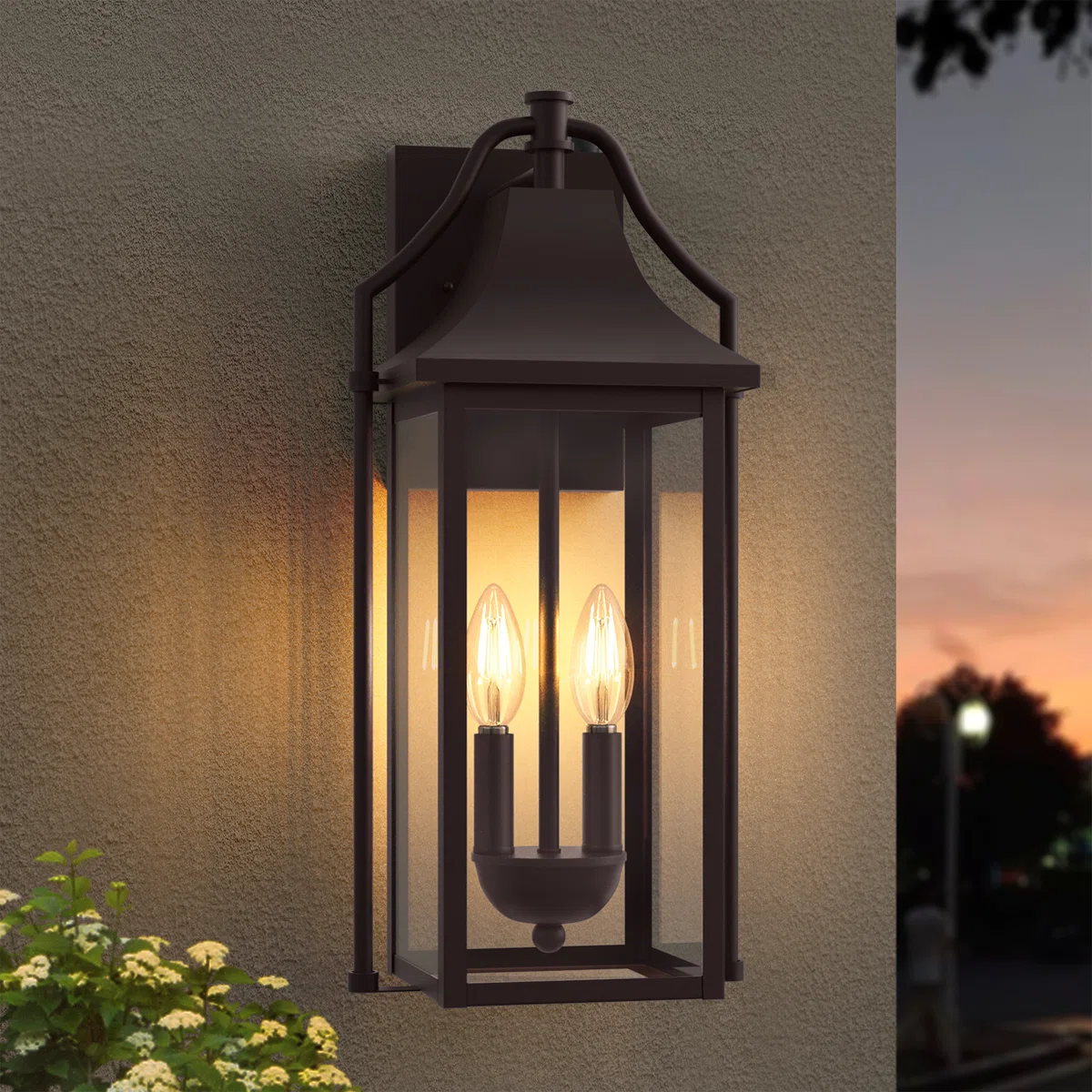 Outdoor wall lantern with a bronze finish featuring two vintage-style filament bulbs.
