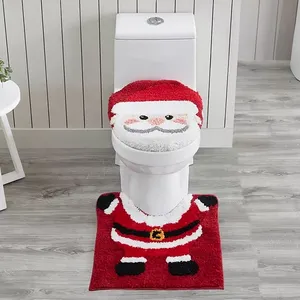Santa Claus-themed bathroom set with a toilet lid cover, tank cover, and rug.