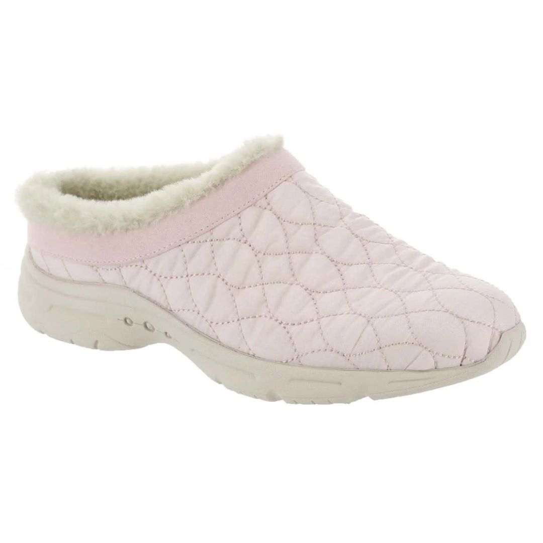 A pink quilted slip-on shoe with a fluffy lining and thick sole, designed for comfort and warmth.