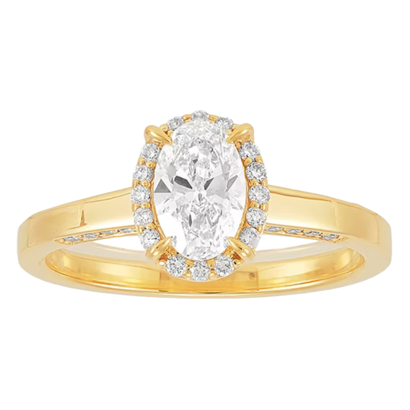 A gold ring featuring an oval-cut diamond center stone, surrounded by a halo of smaller diamonds, with additional diamonds set along the band.