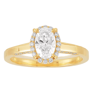 A gold ring featuring an oval-cut diamond center stone, surrounded by a halo of smaller diamonds, with additional diamonds set along the band.