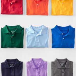 Nine polo shirts in various colors arranged in three rows, each row featuring red, orange, yellow, green, light blue, navy blue, purple, and gray.