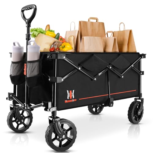 A black collapsible utility wagon with a durable fabric body, featuring an adjustable handle, all-terrain wheels, and integrated cup holders. It is loaded with grocery bags and produce.