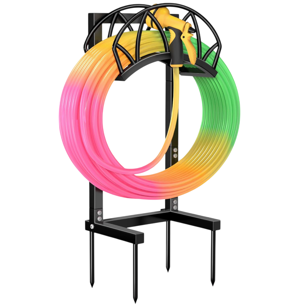 A colorful coiled garden hose with a spray nozzle is mounted on a black wall bracket.