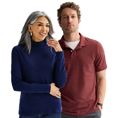 A man in a short-sleeve maroon polo shirt and a woman in a long-sleeve navy turtleneck sweater, both casually dressed.