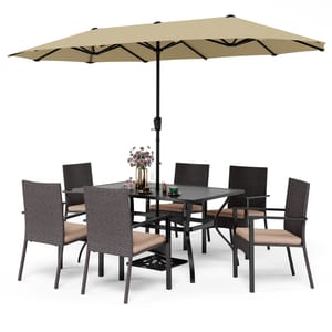 Outdoor dining set with six wicker chairs, a rectangular table, and a beige patio umbrella. A vase with flowers is on the table.