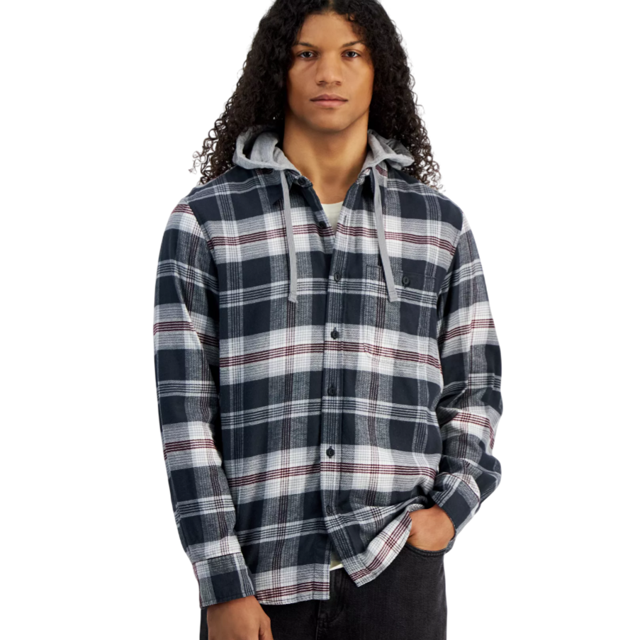 A person wearing a plaid button-up shirt with a hood, featuring a dark blue, gray, and red pattern, paired with black pants.