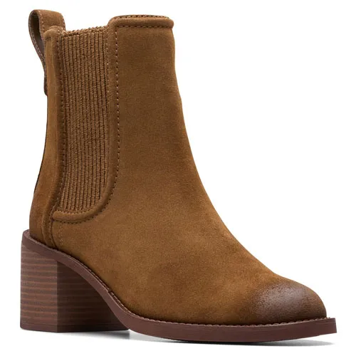 Brown suede Chelsea boot with a stacked heel and elastic side panels for easy slip-on access.