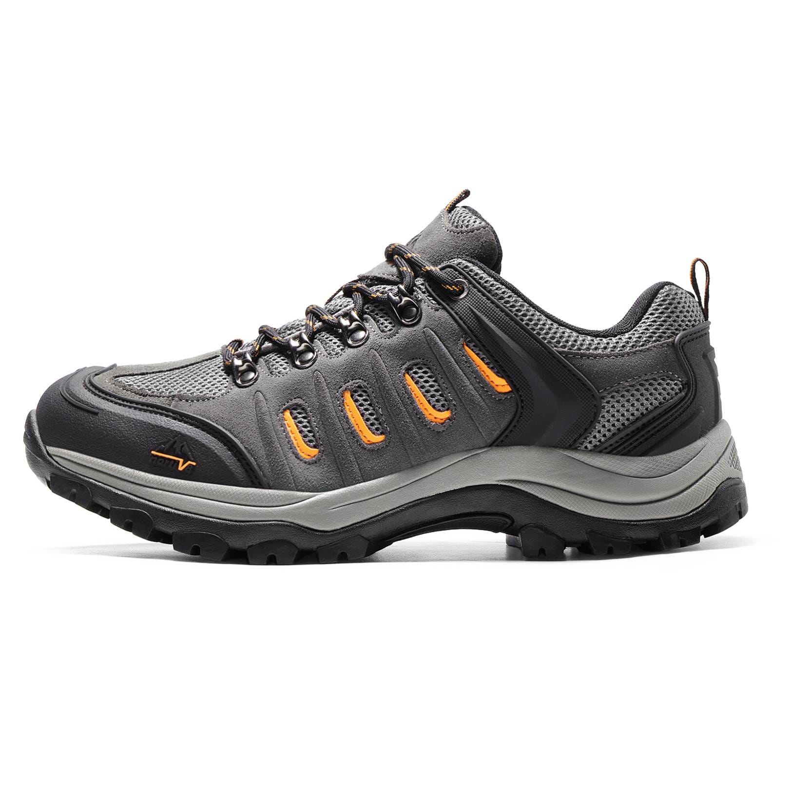 Gray hiking shoe with orange accents, mesh and synthetic upper, durable rubber outsole, and lace-up design.