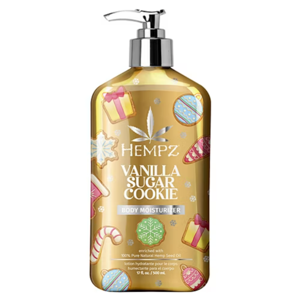Hempz Vanilla Sugar Cookie Body Moisturizer, enriched with 100% pure natural hemp seed oil, features a festive design with cookies and gifts. Size: 17 fl oz (500 ml).