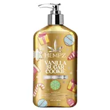 Hempz Vanilla Sugar Cookie Body Moisturizer, enriched with 100% pure natural hemp seed oil, features a festive design with cookies and gifts. Size: 17 fl oz (500 ml).