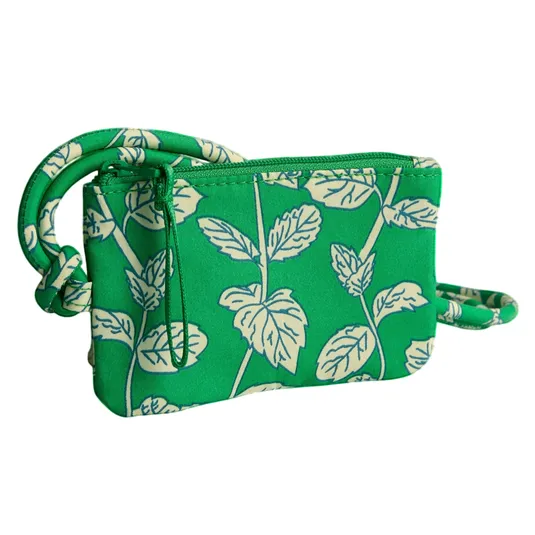 Green pouch with a leaf pattern and a knotted strap, featuring a zipper closure.