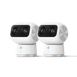 Two Eufy security cameras with dual lenses and a sleek white design, featuring a blue indicator light on the front.