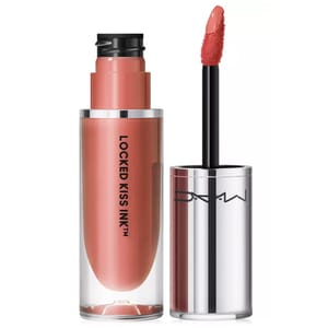 MAC Locked Kiss Ink Lipstick features a sleek cylindrical container and an applicator with a soft tip for precise application. The lipstick is a muted coral shade, designed for long-lasting wear.