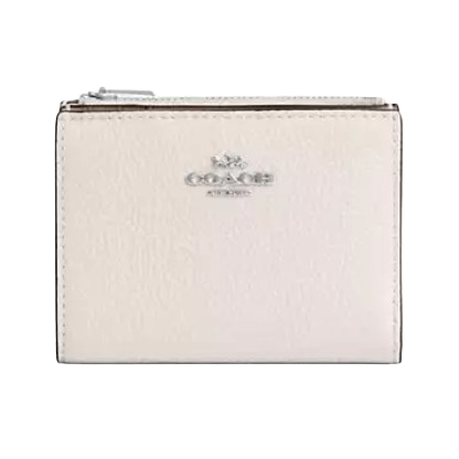 A small, light-colored Coach wallet with a zippered compartment and the brand logo on the front.