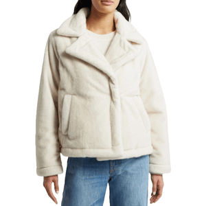 Cream-colored, faux-fur jacket with a notched lapel design, featuring long sleeves, front pockets, and a boxy silhouette.