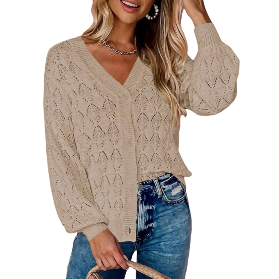 A beige crochet cardigan with a V-neck and button-down front, featuring a delicate, open-knit pattern. It has long balloon sleeves and is paired with high-waisted blue jeans.