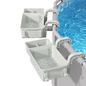 Hanging poolside storage baskets with dual compartments and drainage holes attach to the side of a pool for convenient access to items while swimming.