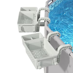 Hanging poolside storage baskets with dual compartments and drainage holes attach to the side of a pool for convenient access to items while swimming.