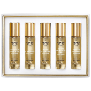A fragrance gift set by Creed containing five 10ml bottles of Eau de Parfum: Aventus for Her, Carmina, Wind Flowers, Royal Princess Oud, and Spring Flower. Made in France.