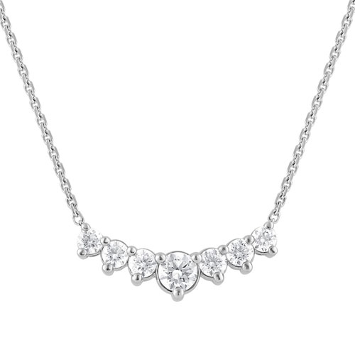 A delicate necklace featuring a row of seven sparkling, round-cut stones set in a symmetrical pattern on a fine chain.