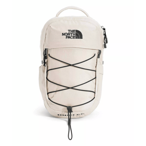 The North Face Borealis Mini backpack in white, featuring a logo, front bungee cord system, and zippered compartments.